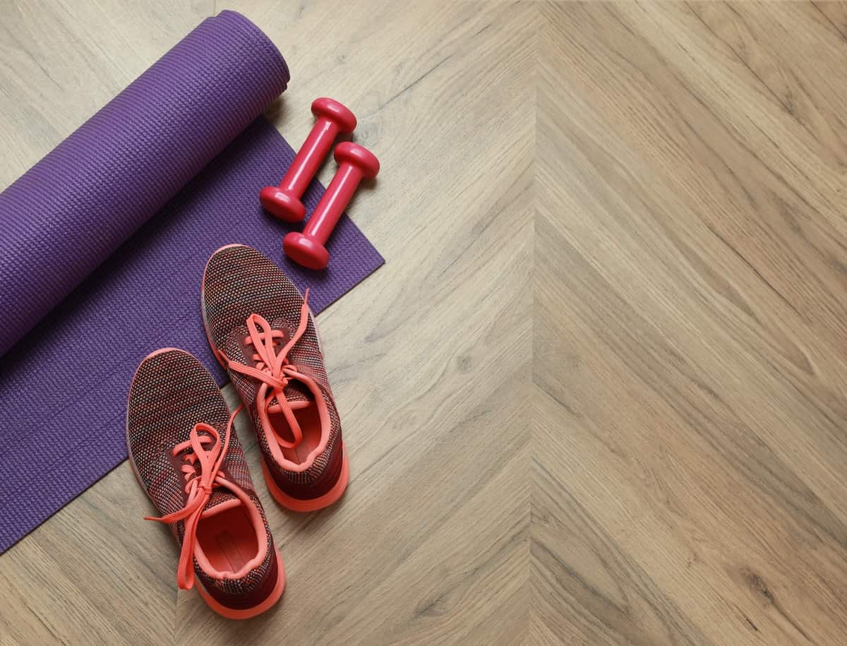 fitness accessories including shoes, yoga mat, weights